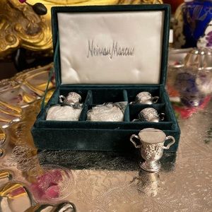Set of six silver plated placecard holders from the prestigious Neiman Marcus.